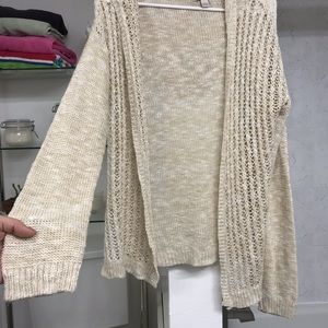 knitted cream- colored cardigan
